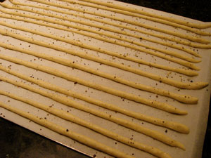 Unbaked grissini bread sticks