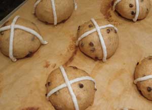 Piped crosses on hot cross buns