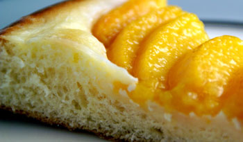 slice of peach brioche tart