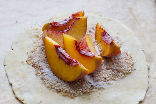 peach galette construction with breadcrumbs