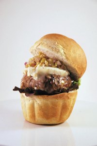 Hamburger with lamb, goat cheese and olive relish