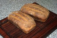 Sourdough Brown Loaf On Bricks